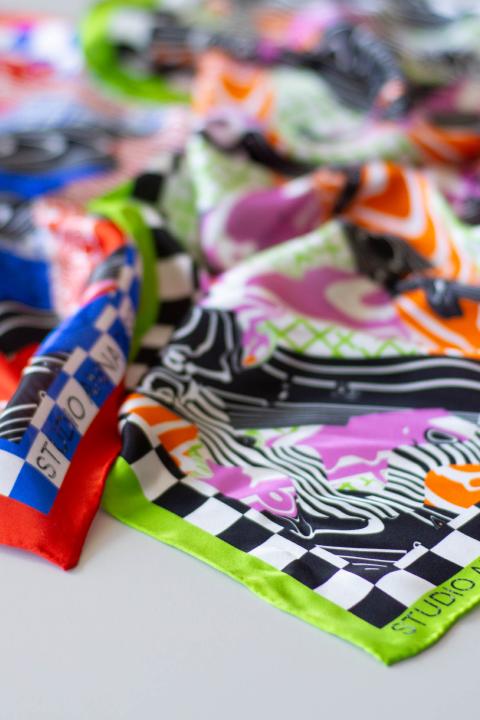 An image of the work flow silk scarves by Designer Anna Resei